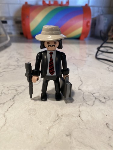 Mafioso with gun and briefcase - mafioso,
